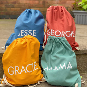 Four personalised PE bags in different colours. 